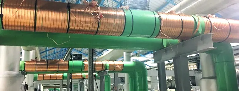 Bandas de impulso Vulcan instaladas en tuberías industriales